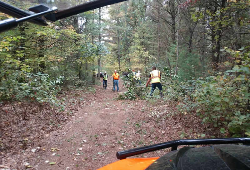 Dellwood Moundview Snowmobile Club clearing trails